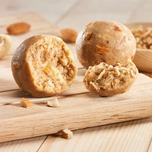 Load image into Gallery viewer, golden grain wheat healthy laddus loaded with dry fruits made with jaggery and ghee