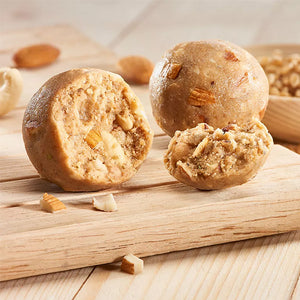 golden grain wheat healthy laddus loaded with dry fruits made with jaggery and ghee